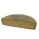 raclette cheese with fenugreek seeds half wheel