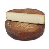 Full wheel of smoked raclette cheese wheel